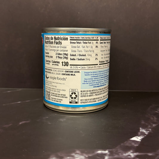 Leche Condensada Magnolia en lata de 14oz, ingrediente esencial para postres latinos disponible en Melomanda
